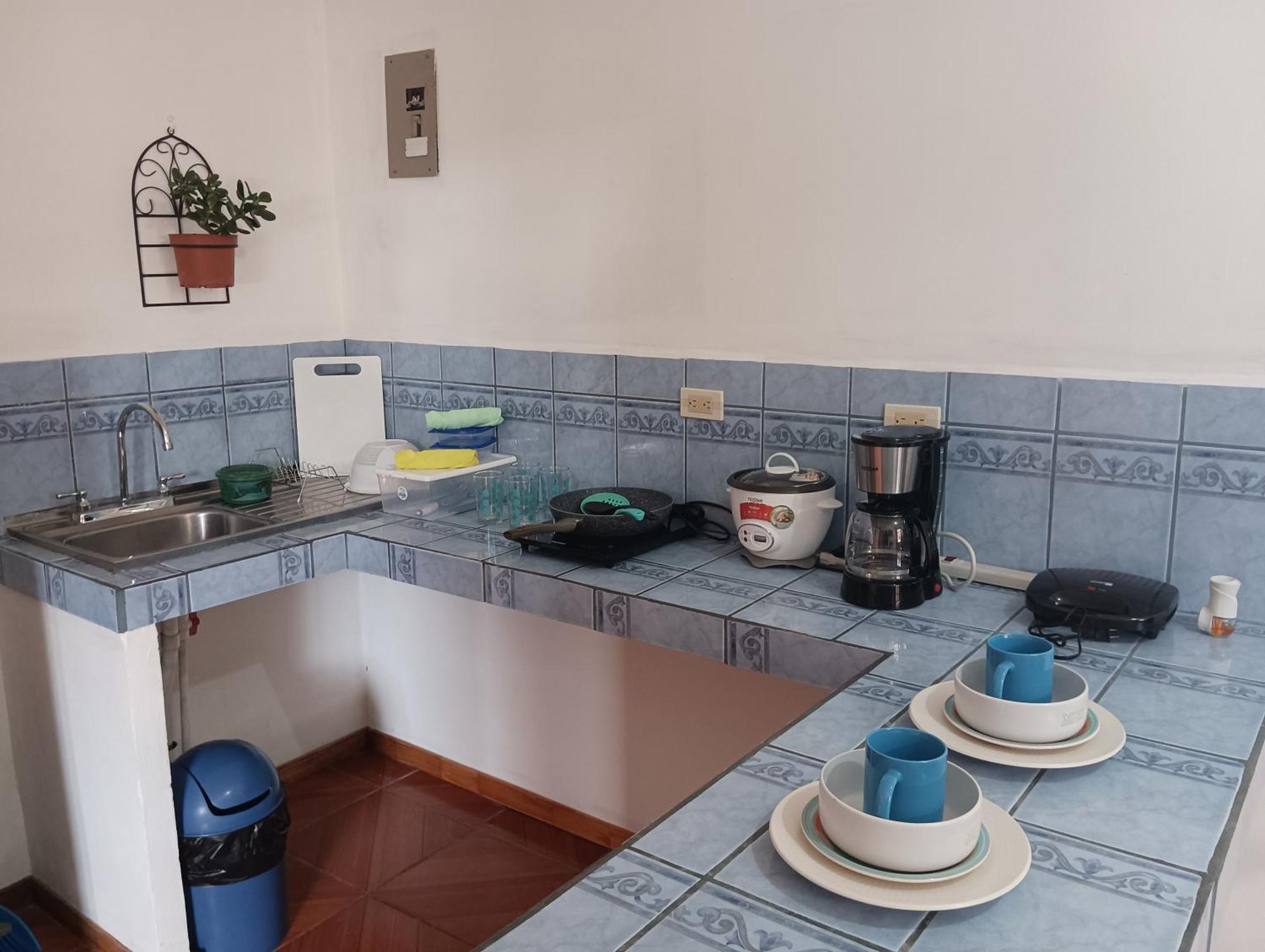 Mochis Apartamento Quepos Quarto foto